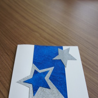 Blue Silver Stars: broad vertical blue strip, over-layed by silver and blue stars.